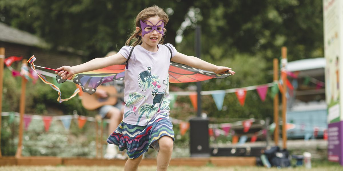 Running through the Summer of Play field at Trelissick, Cornwall ©National Trust Images Steve Haywood