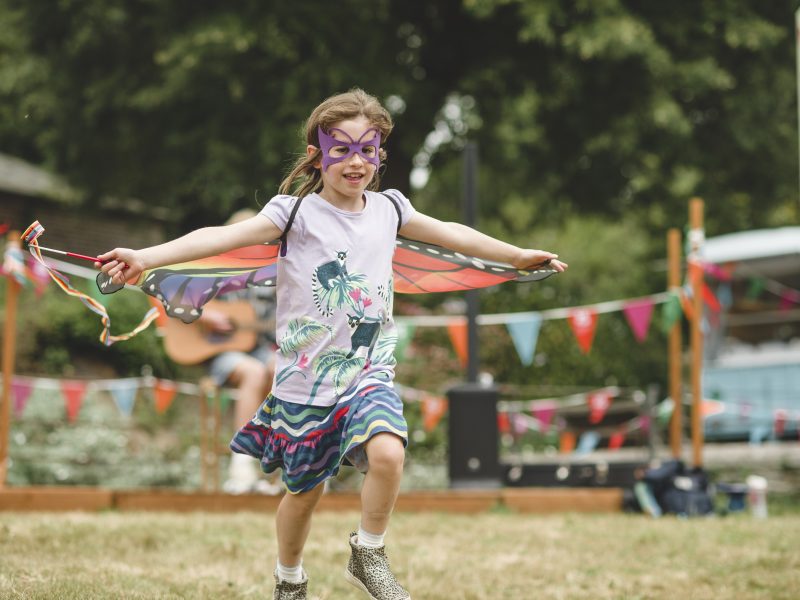 Running through the Summer of Play field at Trelissick, Cornwall ©National Trust Images Steve Haywood