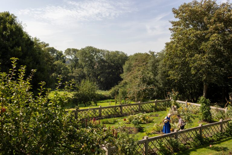 Visitors in the potager at Trerice 768x512